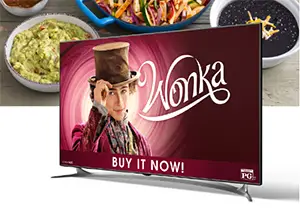 Win a 55″ TV + WONKA Movie from Sharky’s