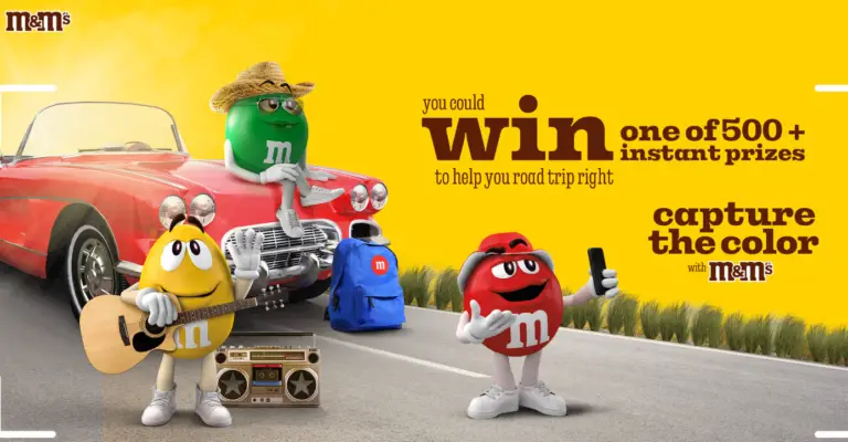 M&M's taking pictures of themselves on a roadway